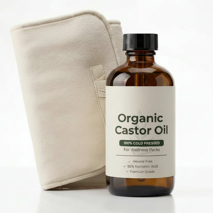 Eden Labs Organic Castor Oil bottle with dropper, a beige fabric pouch, and a dark green product box on a clean white background.